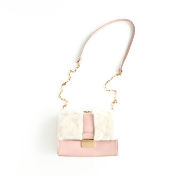 Women's pink bag on white background. flat lay, top view. high quality photo